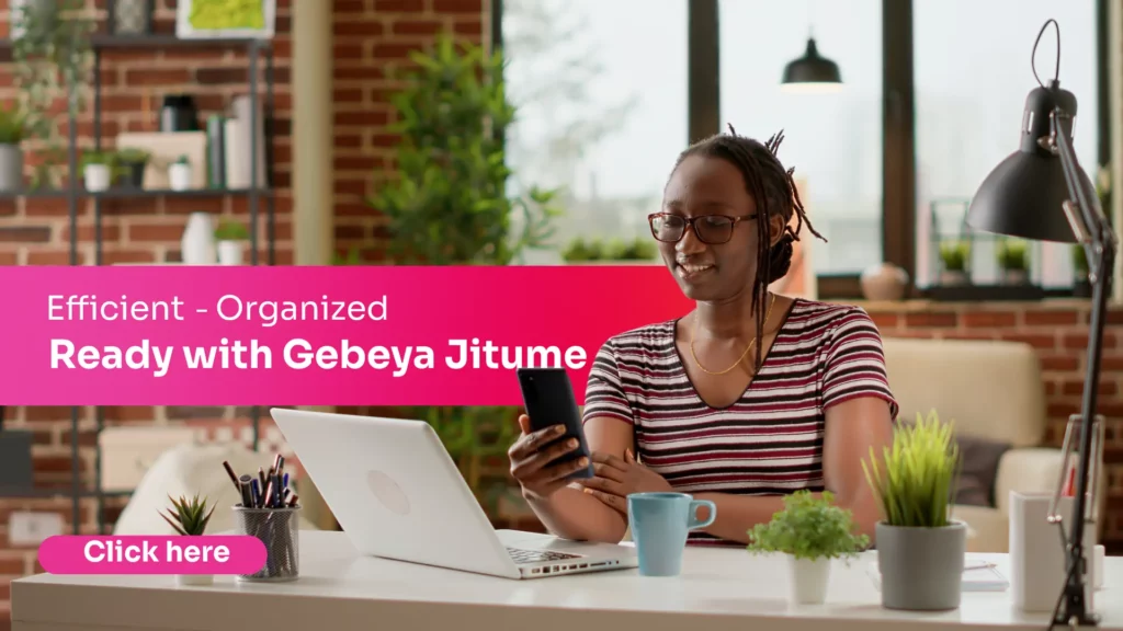 Freelancer managing work from a laptop and phone, representing how Gebeya Jitume helps streamline bookings and payments for solo professionals.